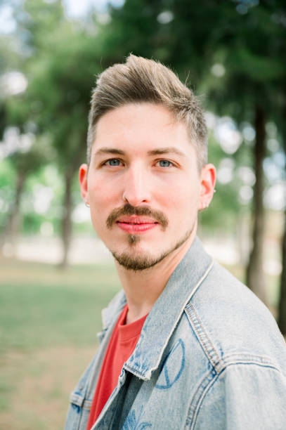 istock portrait of handsome guy looking at camera 2156296942