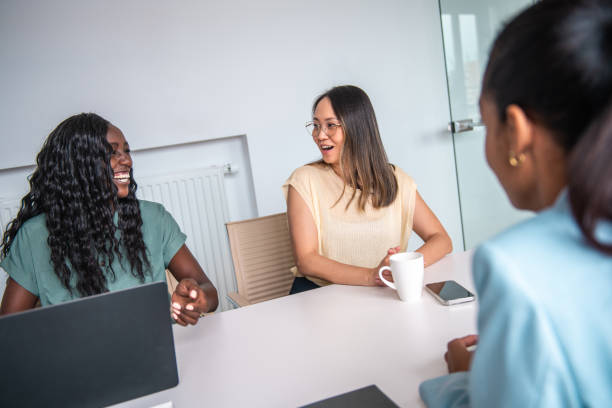 istock Diverse Businesswomen Engaged in Discussion 2156299193