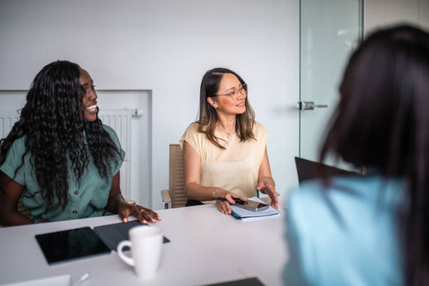 istock Diverse Businesswomen Engaged in Office Teamwork 2156299230
