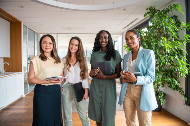 istock Diverse Businesswomen Teamwork in Modern Office 2156299231
