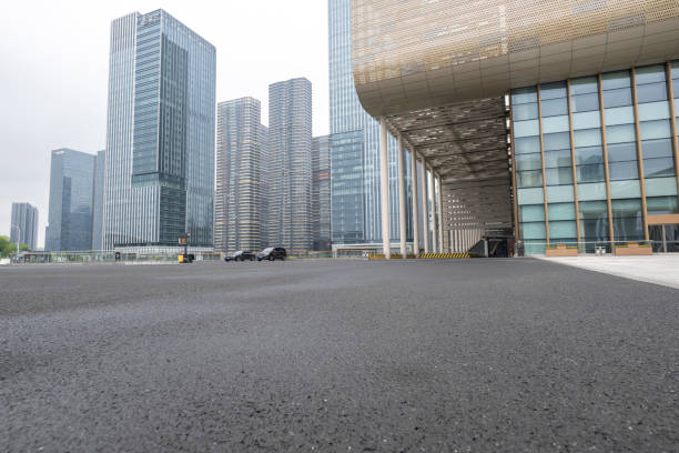 istock Empty asphalt road in front of modern city buildings 2156299897