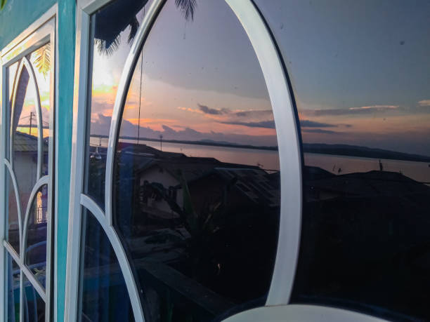 Reflection of sunset light from the window