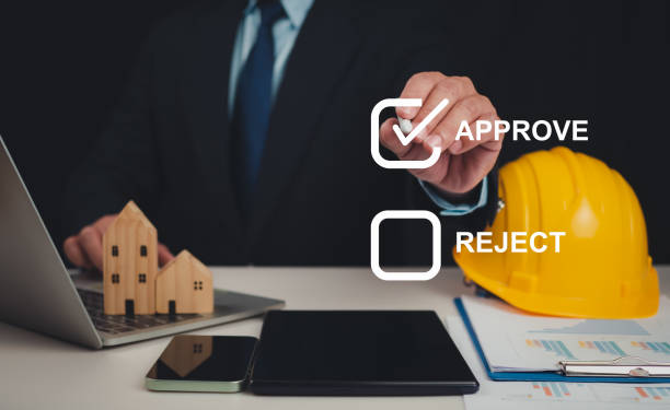 istock Approved Buildings Permit concept with approved residential building project, Architect or engineer Checking the list of documents and approving the project, Construction project inspection. 2156302295