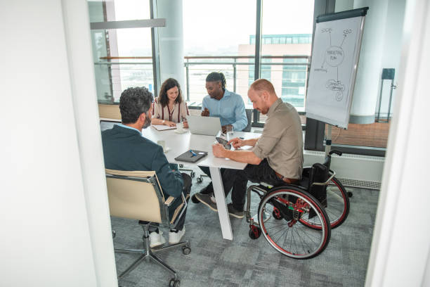 istock Inclusive Business Strategy Session with Diverse Team 2156302468