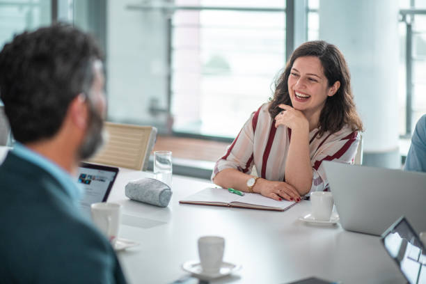 istock Joyful Business Team Engages in Productive Meeting 2156302537
