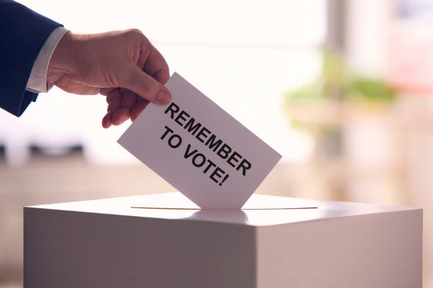 istock Person Casting Ballot in Election 2156303649