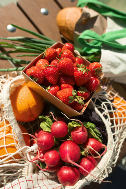 Red ripe strawberry background, close-up, front view, top view, strawberry plate with wood floor background,