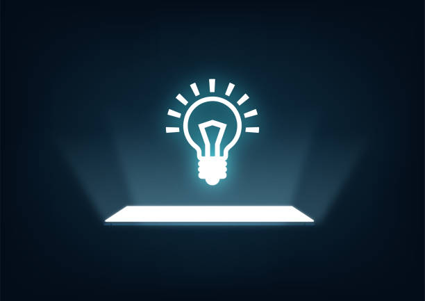 Glowing light bulb hologram on digital tablet, creativity of idea concept business technology innovation