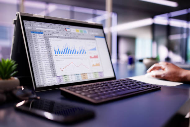 istock Financial Analyst Woman Using Hybrid Medical Software on Laptop to Analyze Data 2156306561