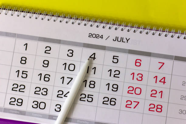 istock July 2024 desk calendar on your desktop for planning. 2156307807