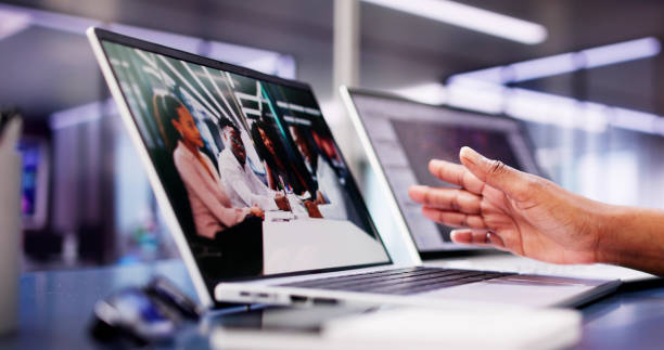 istock Businesswoman holding online remote video conference webinar from a mountain castle using laptop screen 2156307953
