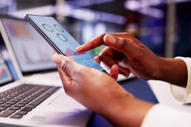 istock The African Financial Advisor utilizes a KPI dashboard with analytics graphs to monitor stock market trends 2156307969