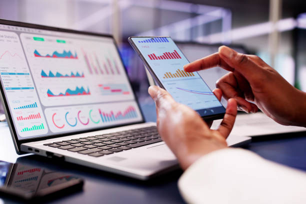istock The African Financial Advisor utilizes a KPI dashboard with analytics graphs to monitor stock market trends 2156307973