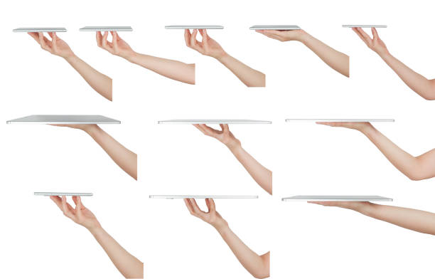 Collection of hands holding digital tablet or smart phone white background, side view