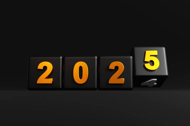 istock Cube with 2024 flips over replaced by the latest 2025 on black background 2156312240