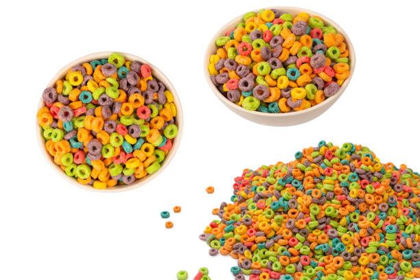 istock Colorful rings cereal spill out into a bowl. Breakfast. Isolated. 2156315093