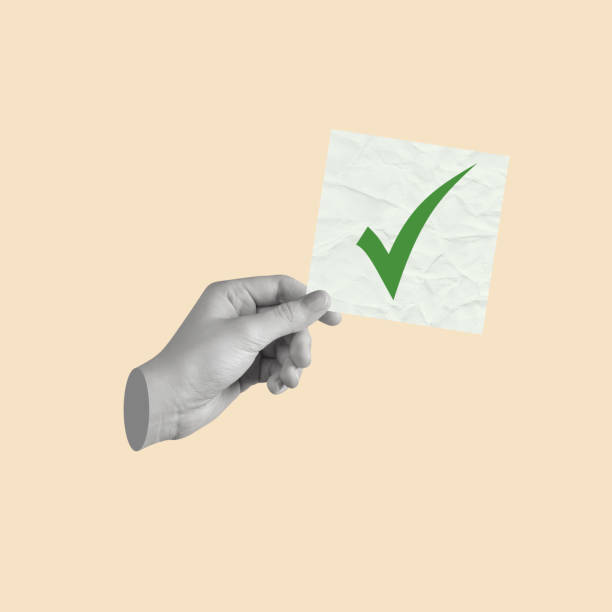 istock Modern art collage of a hand holding the check mark icon. 2156317308