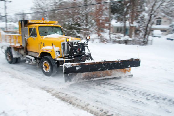 istock Heavy construction equipment clearing snow on MacArthur Boulevard near Washington, DC, during the winter snowstorm of 2010. 2156321295