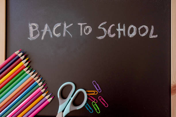 istock back to School words on blackboard with colourful pencils and scissors 2156323209
