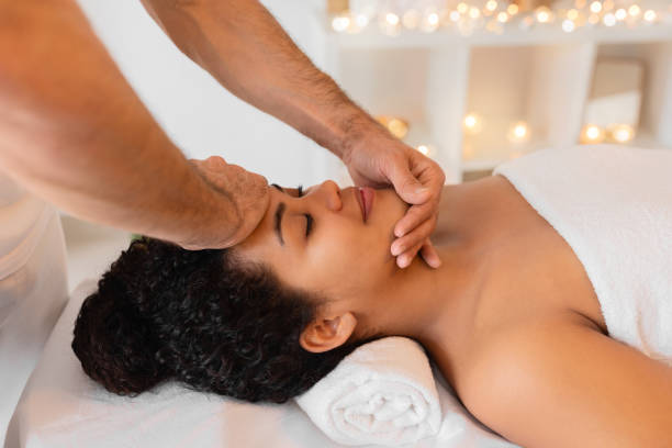istock Therapeutic face massage in a serene spa 2156323508
