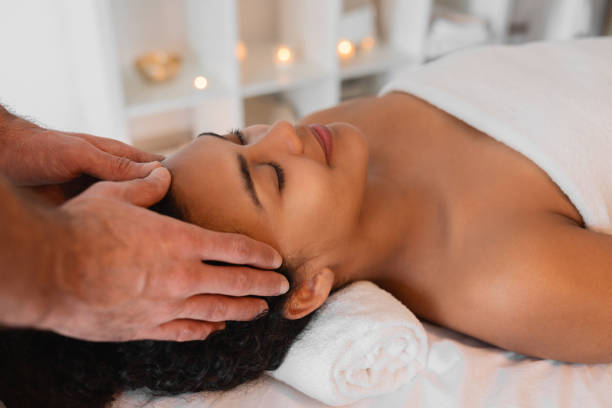 istock Peaceful woman with eyes closed in spa 2156323510