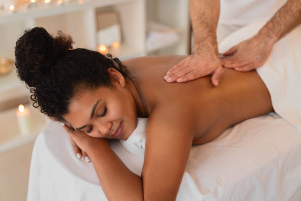 istock Woman receiving a relaxing back massage at spa 2156323547