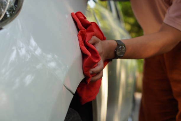 istock A woman's hand cleaning a car 2156323664