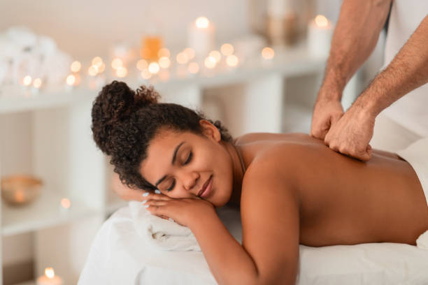 istock Relaxed African American woman at a spa therapy 2156323743