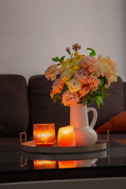istock summer bouquet in home interior with burning candles 2156325060