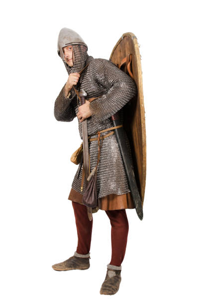 istock Norman knight dressed warrior 2nd half of the 11th century. Isolated on white 2156327112