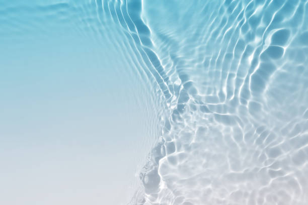 abstract blue white water wave. natural swirl pattern texture. background photography.
