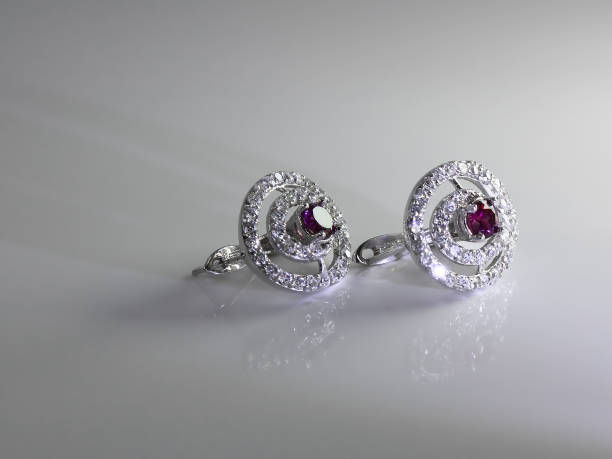 istock earrings with diamonds and amethyst on grey background 2156331351