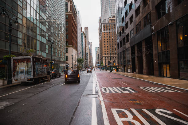 Bus lane on a street in NYC. USA Streets of New York, details, and the beautiful buildings of Manhattan boris bus stock pictures, royalty-free photos & images