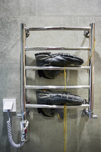 istock Hiking shoes drying after big camping. 2156334496