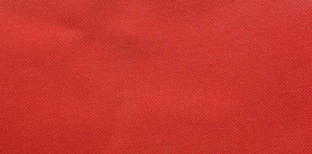istock A background  and texture of teak cloth carpet red pattern style. 2156335262