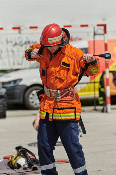 istock Firefighter Training and Preparing in Professional Gear for Job Hazards 2156345549