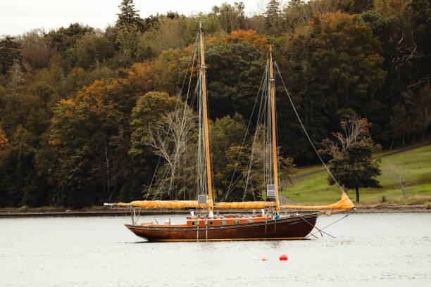 A sailboat anchored in a bay in Lunenburg, Nova Scotia.