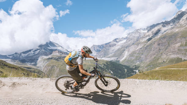 istock Mountain Biker Descending a Scenic Alpine Trail 2156346243