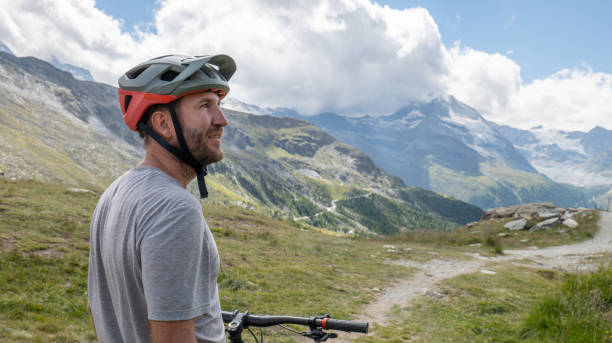 istock Mountain Biker Admiring Alpine Landscape 2156346442