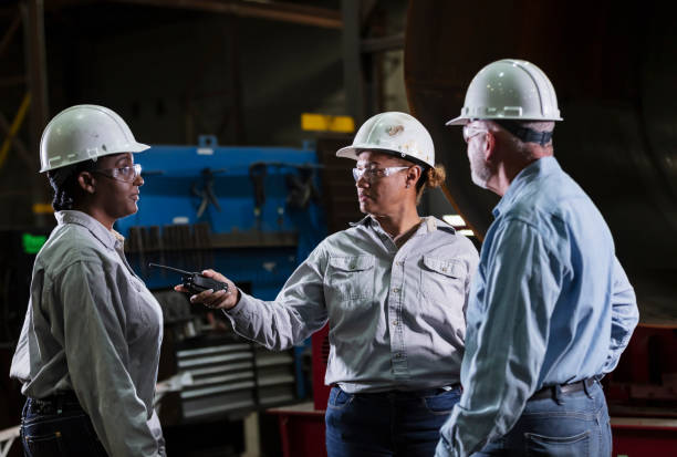 istock Multiracial workers having meeting in factory 2156353869