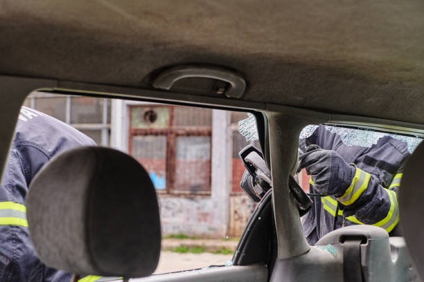 istock A dedicated team of professional firefighters employs specialized tools to cut and break through vehicle wreckage, showcasing their skilled collaboration and swift response in rescuing individuals involved in a car accident 2156357785