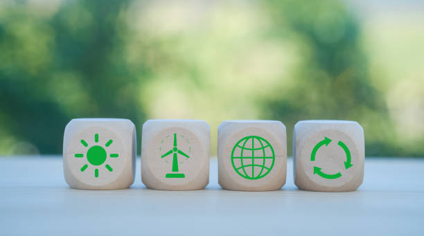 istock Carbon neutral concept. Net zero greenhouse gas emissions target. Climate neutral long term strategy. wooden cubes with decarbonization icon and green icon. Green banner. 2156361297