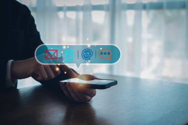 istock Businessman  touching on virtual screen with the email,  address, call phone, Chat message icons. Customer support hotline Contact us people connection. 2156361482