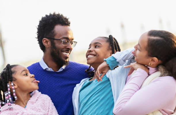 istock Multiracial family having fun on city waterfront 2156363729