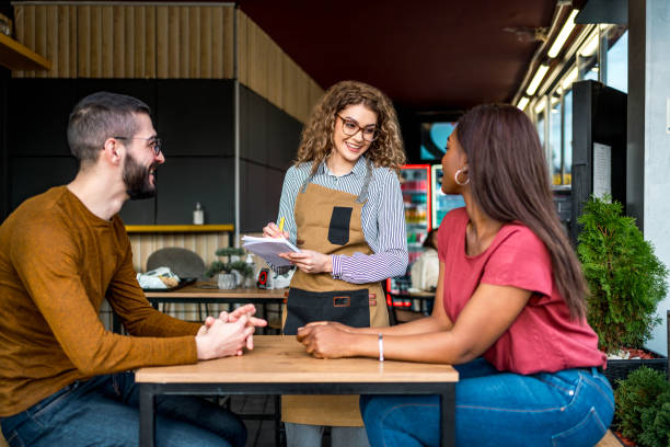 istock Waitress receiving orders at a fast food restaurant 2156368836