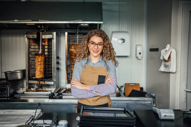 istock Woman working at a fast food restaurant 2156369175