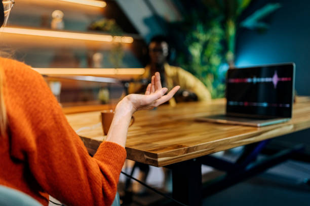 istock Man and woman talking on podcast 2156371071