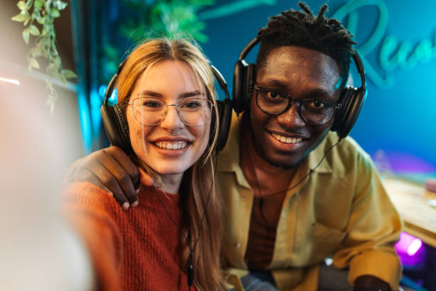 istock Man and woman taking a selfie after podcast 2156372058