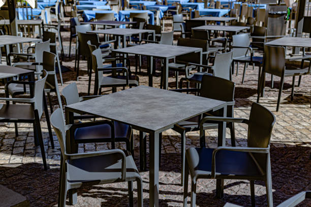 Madrid, Spain. Empty restaurant tables and chairs in Plaza Mayor in Madrid.