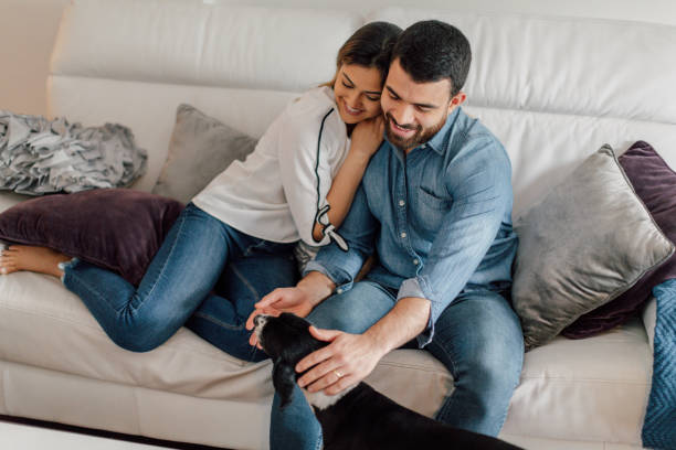 istock Young couple relaxing at home 2156377208